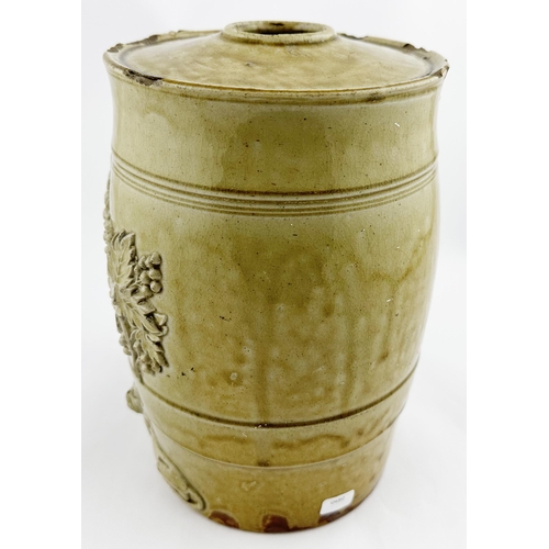 625 - WHISKEY SLIP GLAZE BARREL. 8.25ins tall. Coat of arms to front, sprigged with lion & leaves at eithe... 