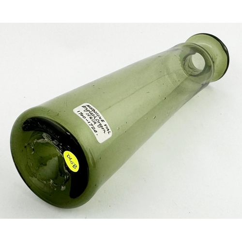 628 - MEDICINE VIAL BOTTLE. 5.5ins tall. Pale green glass. Tall, thin wall, inward tapering body, short ne... 