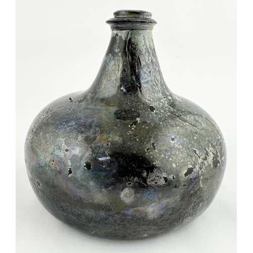 631 - ENGLISH ONION WINE BOTTLE. 5.5ins tall, black/ dark green glass. Overall patination/ irridescence. A... 