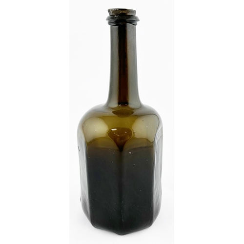 633 - ENGLISH OCTAGONAL BODIED WINE BOTTLE. 10ins tall. Black/ dark brown-green glass, c. 1755-60. Eight c... 