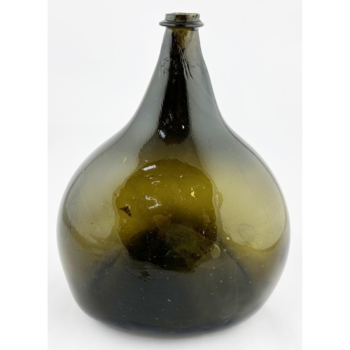 635 - ENGLISH MAGNUM SIZE BLADDER WINE. 10ins tall. Double capacity bladder form, black/ dark green glass.... 