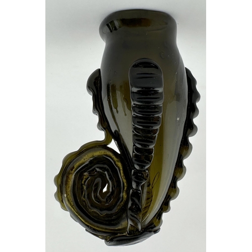 643 - FREEBLOWN SNUFF (MULL) BOTTLE. 3.65ins long. An exquisite & most extraordinary, unique, black glass/... 