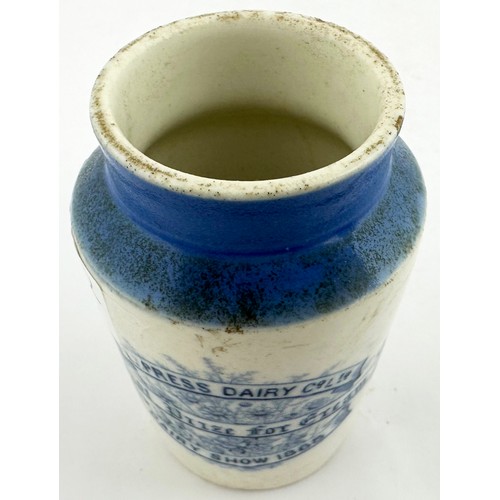 572 - EXPRESS DAIRY CO CREAM POT. 4ins tall. Blue top, off white body. Blue transfer, flowers to front for... 