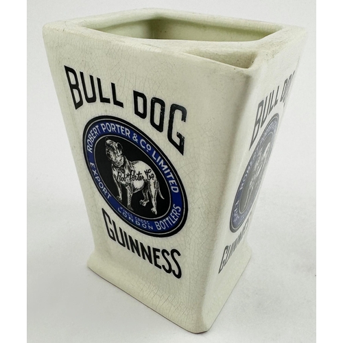 21 - ROBERT PORTER & CO BULL DOG GUINNESS. 4.4ins tall. Diamond shaped jug, integral handle. Black & blue... 