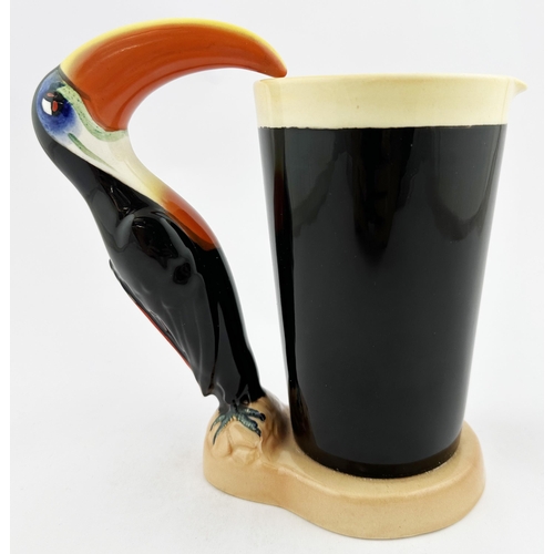 22 - MY GOODNESS MY GUINESS TOUCAN 22 JUG. 7.1ins tall. Multi coloured toucan supping from large, front l... 
