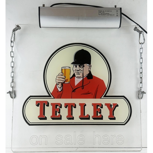 32 - TETLEYS LIGHT UP HANGING PUB SIGN. 18 x 20.5ins. An early, period, perspex hanging sign with origina... 