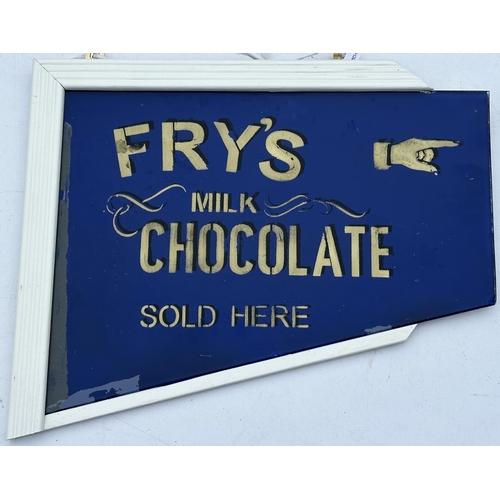 39 - FRYS MILK CHOCOLATE HANGING SHOP SIGN. 14 x 7ins. A rather unusual printed glass sign featuring a po... 
