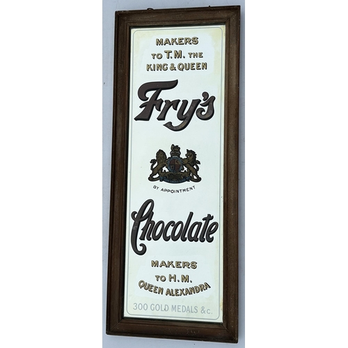 41 - FRYS CHOCOLATE MIRROR. 29.75 x 12ins. Wooden frame, slight damage & discolouration Really heavy