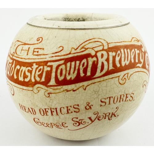 43 - TADCASTER TOWER BREWERY PROMOTIONAL MATCH HOLDER. 2.75ins tall. Spherical ball shape, orange print a... 