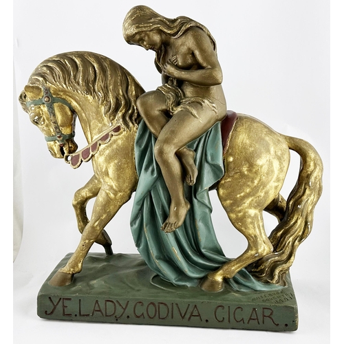 59 - YE LADY GODIVA CIGAR ADVERTISING FIGURE. 18.75 x 15.5ins. Sparsely clad female sat on a horse figure... 