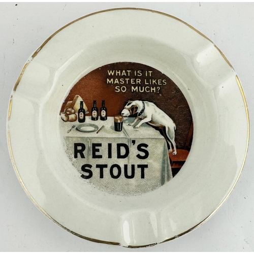 76 - REIDS STOUT ASHTRAY. 5ins diam. Great image of dog drinking pint to centre, outer gold band. James G... 