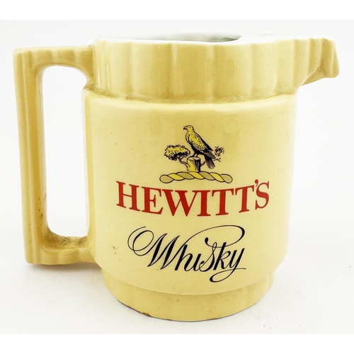 96 - HEWITTS WHISKY JUG. 4.5ins tall. Transferred both sides. Ridged rim, side handle. Arklow Pottery bas... 