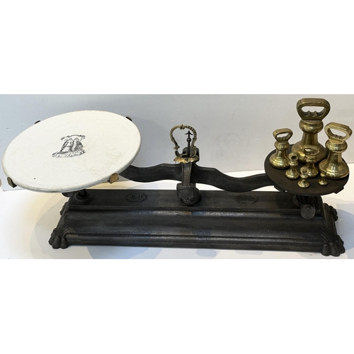 103 - LARGE STILTON G & L SCALES WITH SET OF BRASS WEIGHTS. Base 33ins long, 8ins wide, 14.5ins tall. A re... 