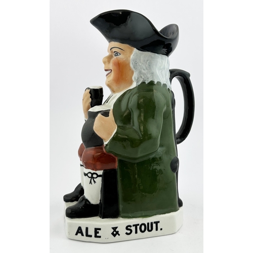 122 - TOBY ALE & STOUT TOBY JUG 9ins tall. Familiar multi-coloured seated red cheeked toper, glass in hand... 