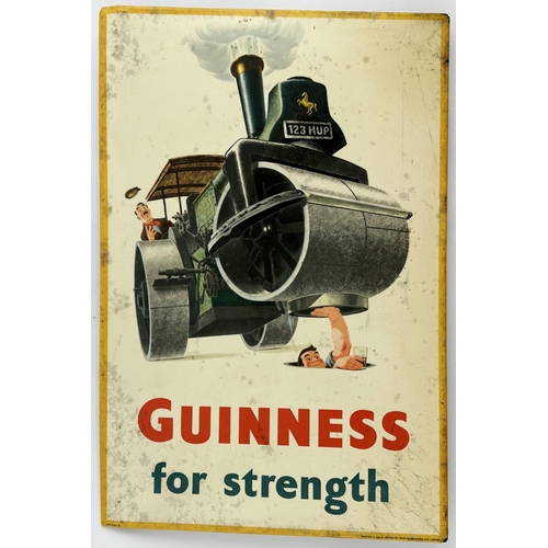 128 - GUINNESS FOR STRENGTH LAMINATED SHOWCARD. 14.8 x 9.9ins. Strong gent in a manhole (with a Guinness)l... 