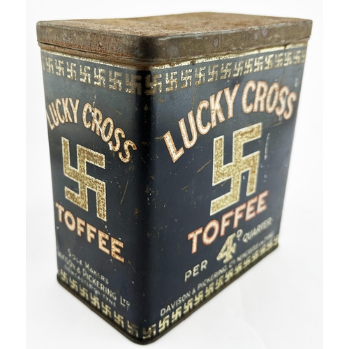 147 - LUCKY CROSS TOFFEE TIN. 6.25 x 7ins. Design featuring the lucky cross, not to be confused with the S... 