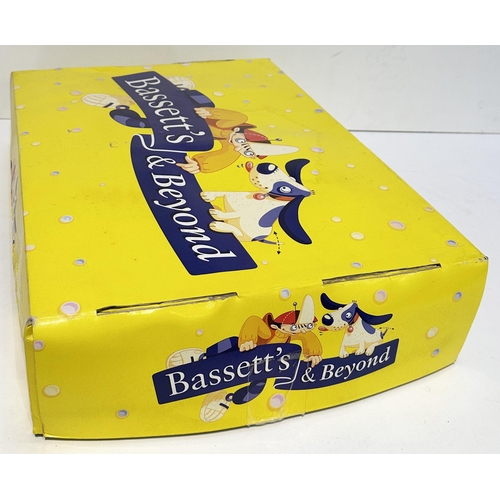 199 - BASSETTS & BEYOND BOX. 20 x 14ins. Bright coloured box with compartments inside. Worn/ damage.