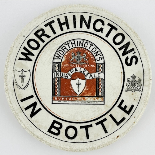 213 - WORTHINGTONS IN BOTTLE BEER COASTER. 5.7ins diam. Curved top centre label facsimile (some wear), dag... 