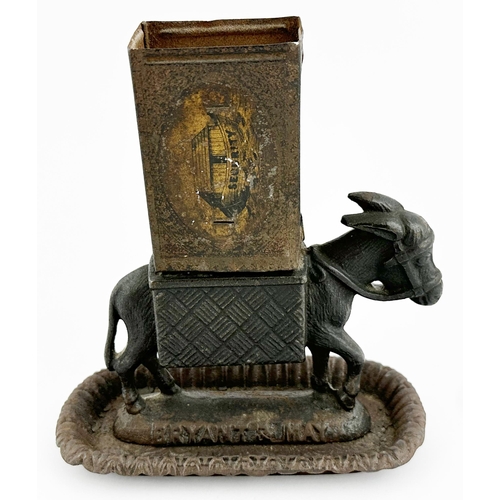 229 - BRYANT & MAY MATCHBOX HOLDER/ ASHTRAY. 6ins tall. In the shape of a donkey.Cast iron ? Reg no to bas... 