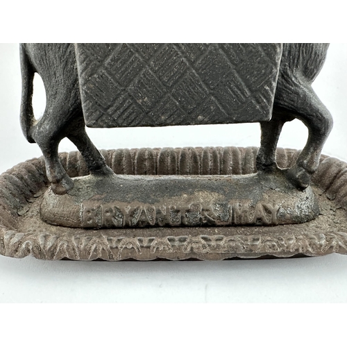 229 - BRYANT & MAY MATCHBOX HOLDER/ ASHTRAY. 6ins tall. In the shape of a donkey.Cast iron ? Reg no to bas... 