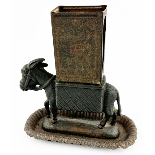 229 - BRYANT & MAY MATCHBOX HOLDER/ ASHTRAY. 6ins tall. In the shape of a donkey.Cast iron ? Reg no to bas... 