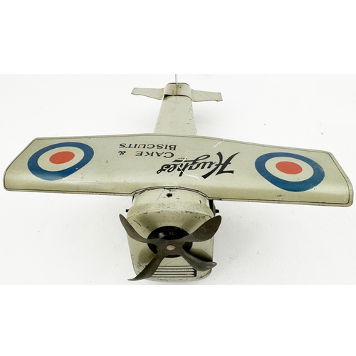 235 - HUGHES CAKES & BISCUITS AEROPLANE. 9.2 x 8 x 3ins. A wonderful period propellor driven silve bi plan... 