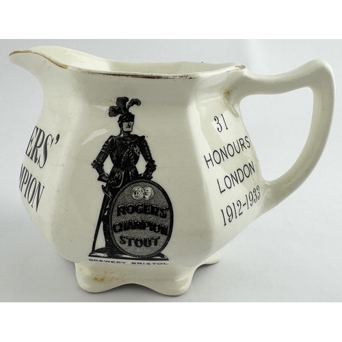 254 - ROGERS CHAMPION ALE PUB JUG. 4.9ins tall. Squat hexagonal shape, flared siz footed bottom, flared ri... 