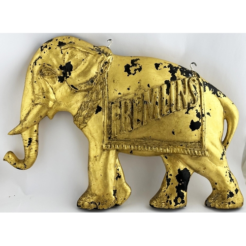 276 - FREMLINS ELEPHANT HANGING SHOP SIGN. 16ins tall, 21ins wide. Standing, double sided, �d elephant gol... 