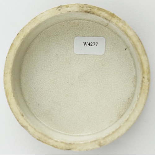 47 - ARMY & NAVY ARECA NUT POT LID. 3ins diam. T.m. to centre. Crisp transfer. Some staining & chips.