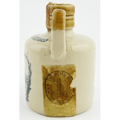 340 - THE GREYBEARD MINIATURE WHISKY FLAGON. 3ins tall. Side handles, paper label to base.