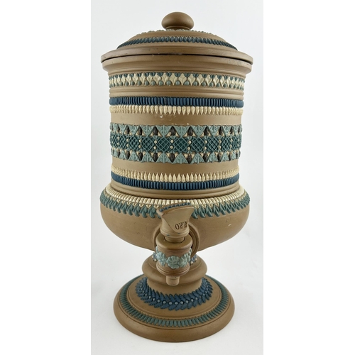 359 - DOULTON SILICONE WARE WATER FILTER. 13.5ins tall. Matt finish with blues, brown & white patterns. Co... 