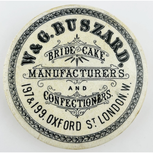 371 - LONDON BRIDE CAKE POT LID. 4ins diam. W & G BUSZARD. Damage & staining.