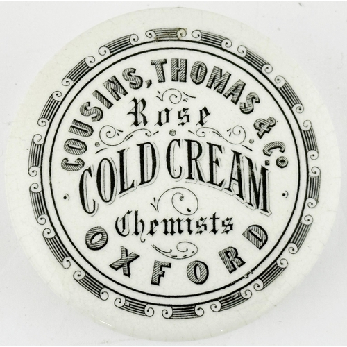 396 - OXFORD COLD CREAM POT LID. (APL pg 532, 1b). 2.9ins diam. Scroll border with writing within COUSINS,... 