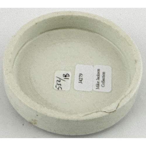 396 - OXFORD COLD CREAM POT LID. (APL pg 532, 1b). 2.9ins diam. Scroll border with writing within COUSINS,... 