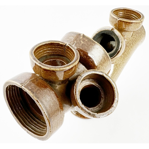 539 - TRADESMANS SAMPLE BUILDERS PIPE. 7.2ins wide, 4.5ins tall. A quite complex shiny salt glaze form, on... 