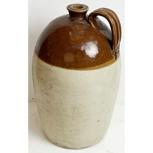 179 - FLAGON. 19.25ins tall. Rear handle, impressed 5, Buchan p.m. Surface wear. 9.5/10 Unsuitable for p+p