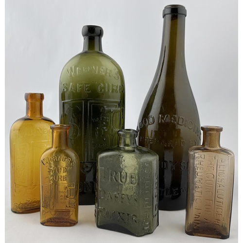 428 - DAFFYS ELIXIR BOTTLE. 4.5ins tall. Olive green glass, rectangular cross scetion, bevelled corners. S... 