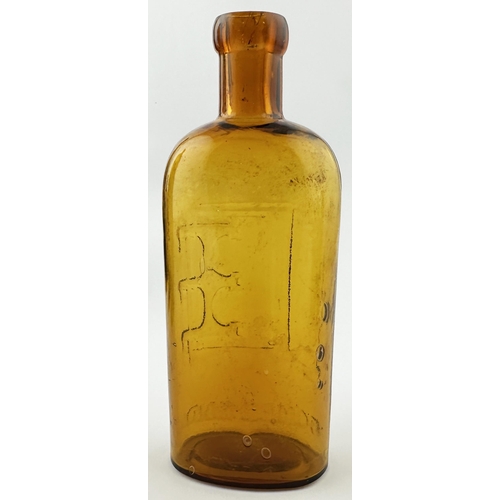 431 - WARNERS SAFE COMPOUND BOTTLE. 6.1ins tall. Golden amber glass with blop lip. This is the round sides... 