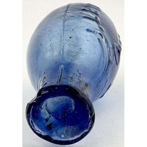 446 - JAS LEWIS MINIATURE HAMILTON BOTTLE. 3.8ins long. Mid blue glass, sheared lip, uneven - see close up... 