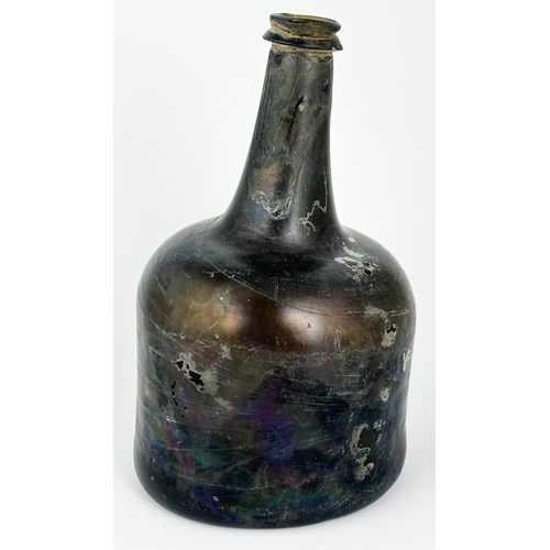 460 - ENGLISH MALLET WINE BOTTLE. 8.2ins tall. Small lip nick. Black glass, not so heavy as others - still... 