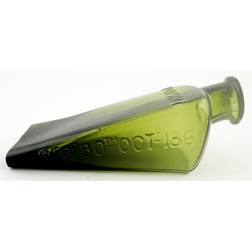 469 - GILBERTSONS WEDGE PATENT POISON BOTTLE. (DP p22). Mid green glass wedge shape gradating to dark gree... 