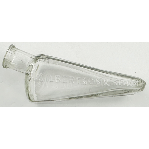 470 - GILBERTSONS WEDGE PATENT POISON BOTTLE. (DP p22). Clear lead glass wedge shape. Very heavily & crisp... 