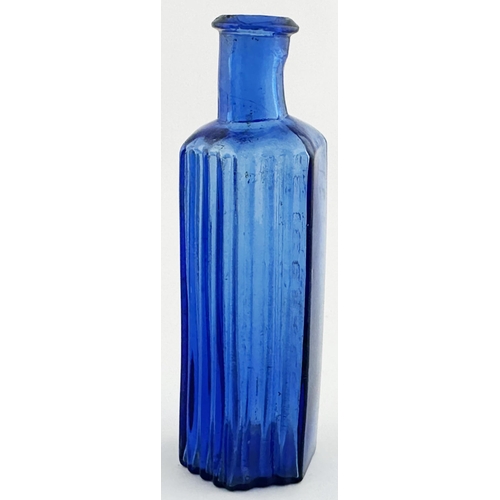 489 - LEICESTER INFIRMARY POISON BOTTLE. (DP p99) 5.2ns tall. Mid blue, vertically ribbed to three sides. ... 