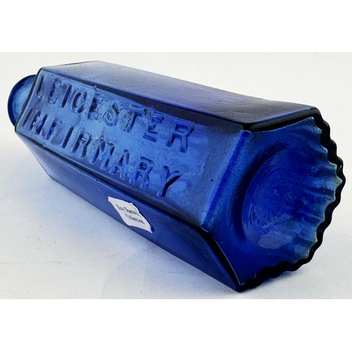 489 - LEICESTER INFIRMARY POISON BOTTLE. (DP p99) 5.2ns tall. Mid blue, vertically ribbed to three sides. ... 