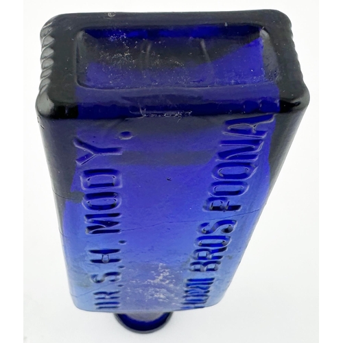 490 - PORTSMOUTH ROYAL HOSPITAL POISON BOTTLE. (DP p115) 5.3ins tall. Cobalt blue rectangular. Front embos... 