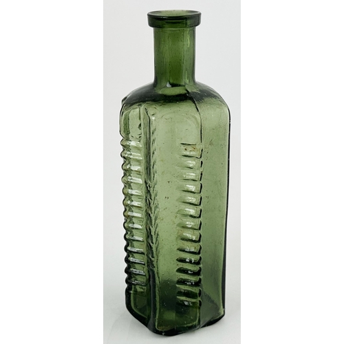 495 - ETON STAR POISON BOTTLE. (DP p58) 6.2ins tall. Green glass, narrow neck. Embossed POISON NOT TO BE T... 