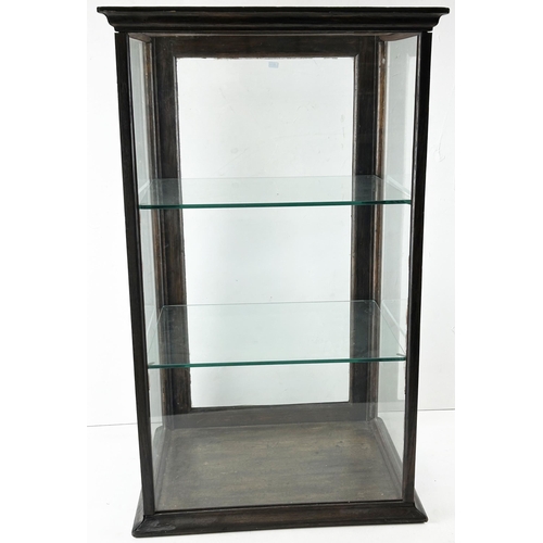 238 - BACK LOADING DISPLAY CABINET. 30 x 18ins. Dark wood, 2 glass shelves. Light to pick up. Worn. 7.5/10... 