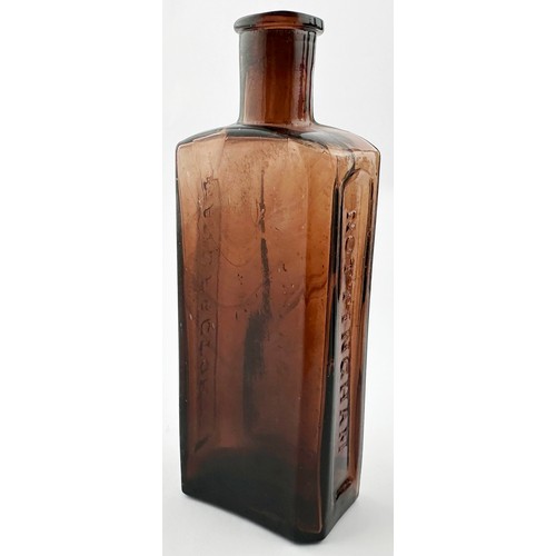 437 - MASON BOTTLE. 6.2ins tall. Extraordinary colour variant for this bottle - cranberry for want of a be... 