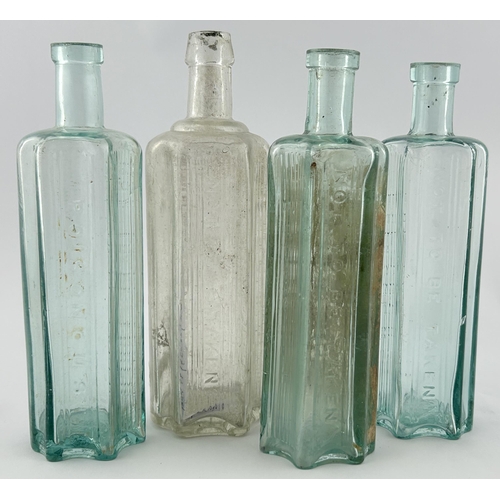 18 - POISON BOTTLE GROUP. Tallest 7.5ins. Embossed & vertically ribbed, one with paper label. Base RWH LD... 