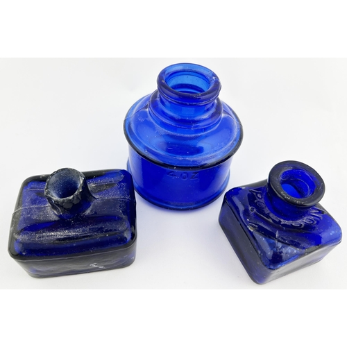 45 - INKS TRIO. Tallest 2.75ins. Cobalt blue glass, slight embossing. Chips. (3)